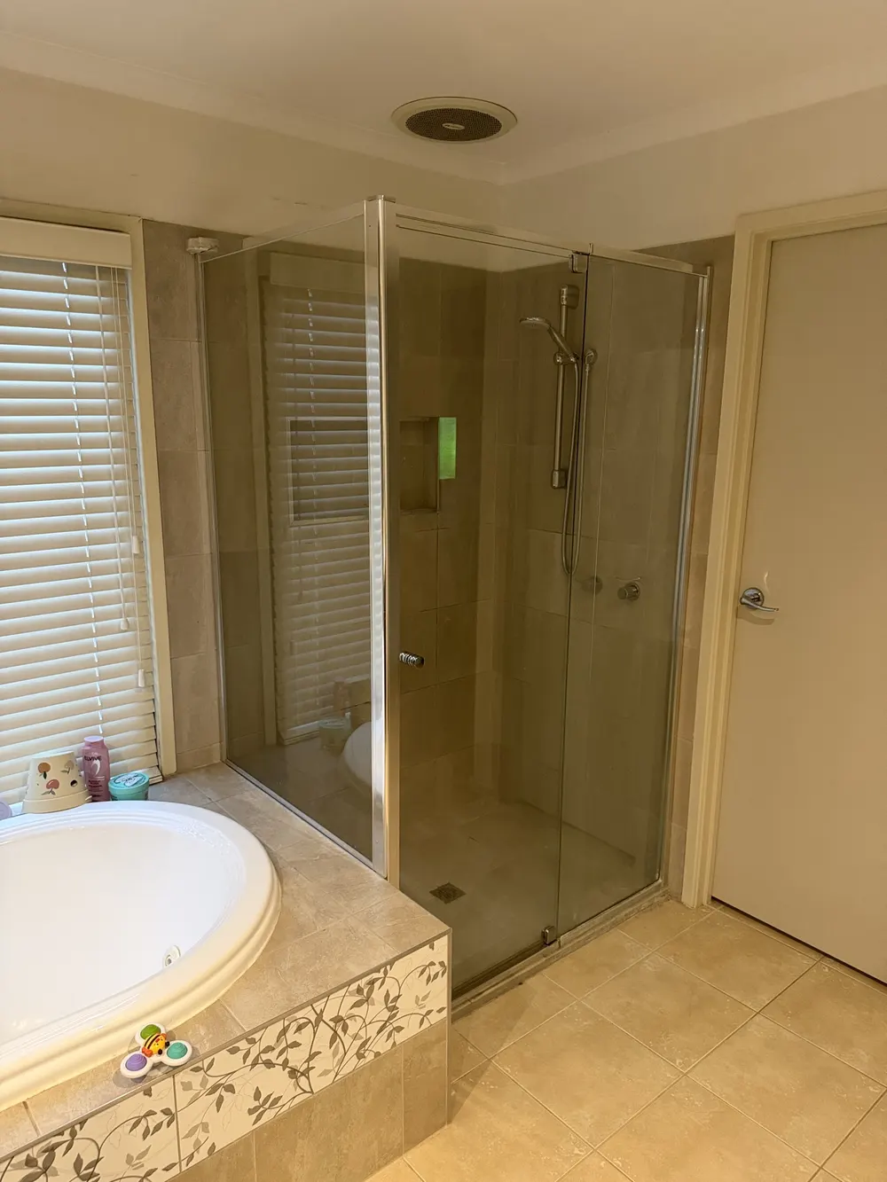 Old framed shower screen before replacement Melbourne