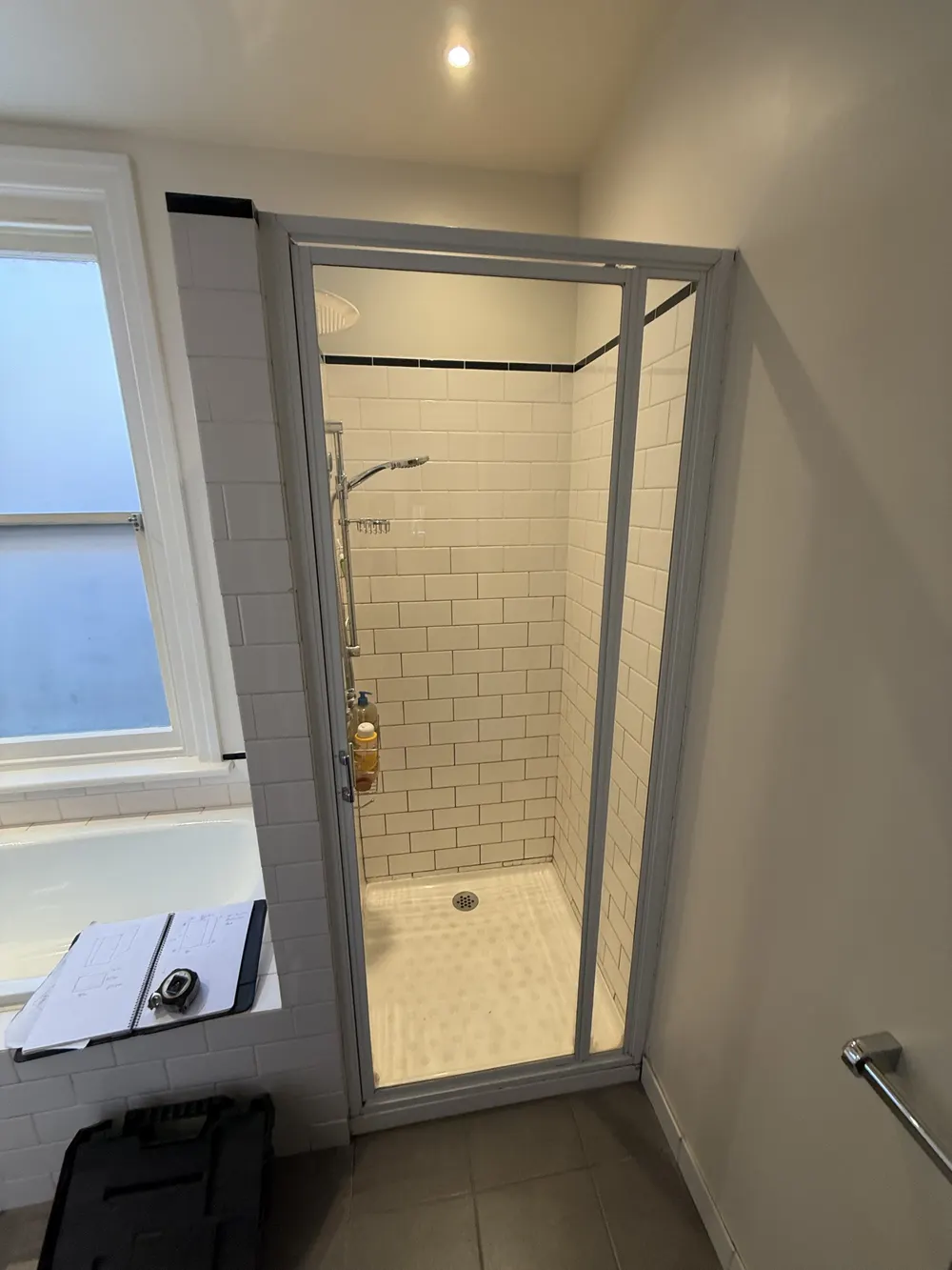 Old grey framed shower screen before replacement Melbourne