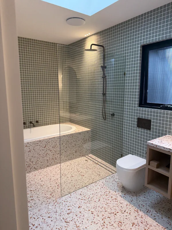 Frameless fixed panel walk-in shower screen